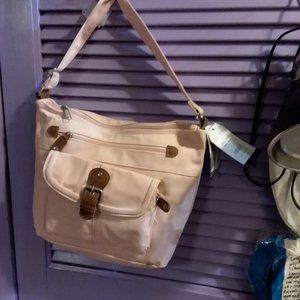 New with tags  adjustable shoulder strap pink denim handbag.